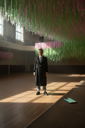 Teddy Girl alone on a streamer-hung ballroom floor.Watermelon Lime MagSafe phone case featured with a Teddy Girl standing alone on a ballroom floor beneath hanging streamers.